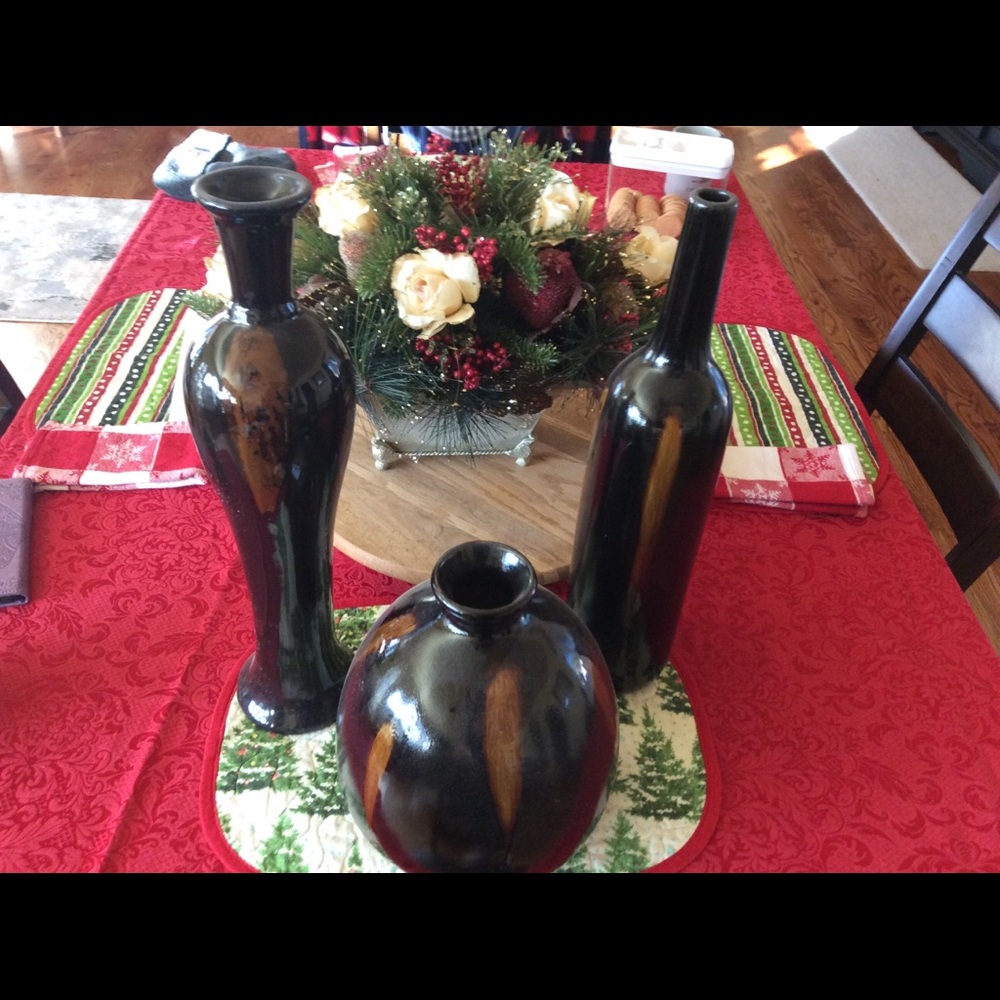 Set of three brown vases